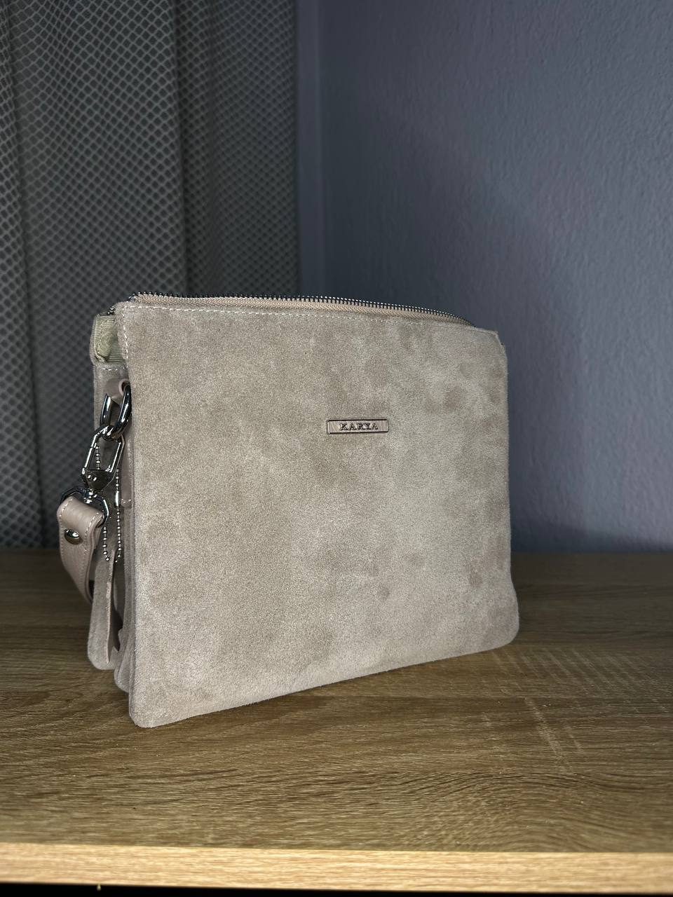 Elegant crossbody bag made of genuine suede in a powder-beige color